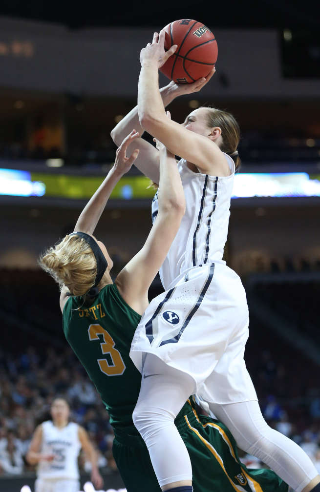 BYU guard Lexi Eaton (21) drives on San Francisco forward Paige Spietz (3) during the West Coast Conference Basketball Championship game in Las Vegas Mar 10, 2015. BYU won 76-65. (Jeffrey D. Allred/Deseret News)