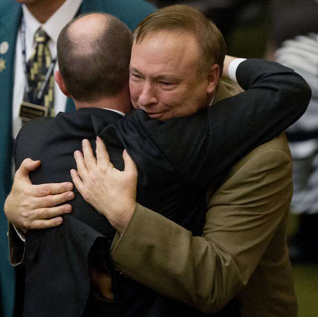 Lt. Governor Spencer J. Cox hugs Senator Jim Dabakis after the Utah House of Representatives voted on and passed SB296 Wednesday, March 11, 2015, anti-discrimination bill. (Scott G Winterton, Deseret News)