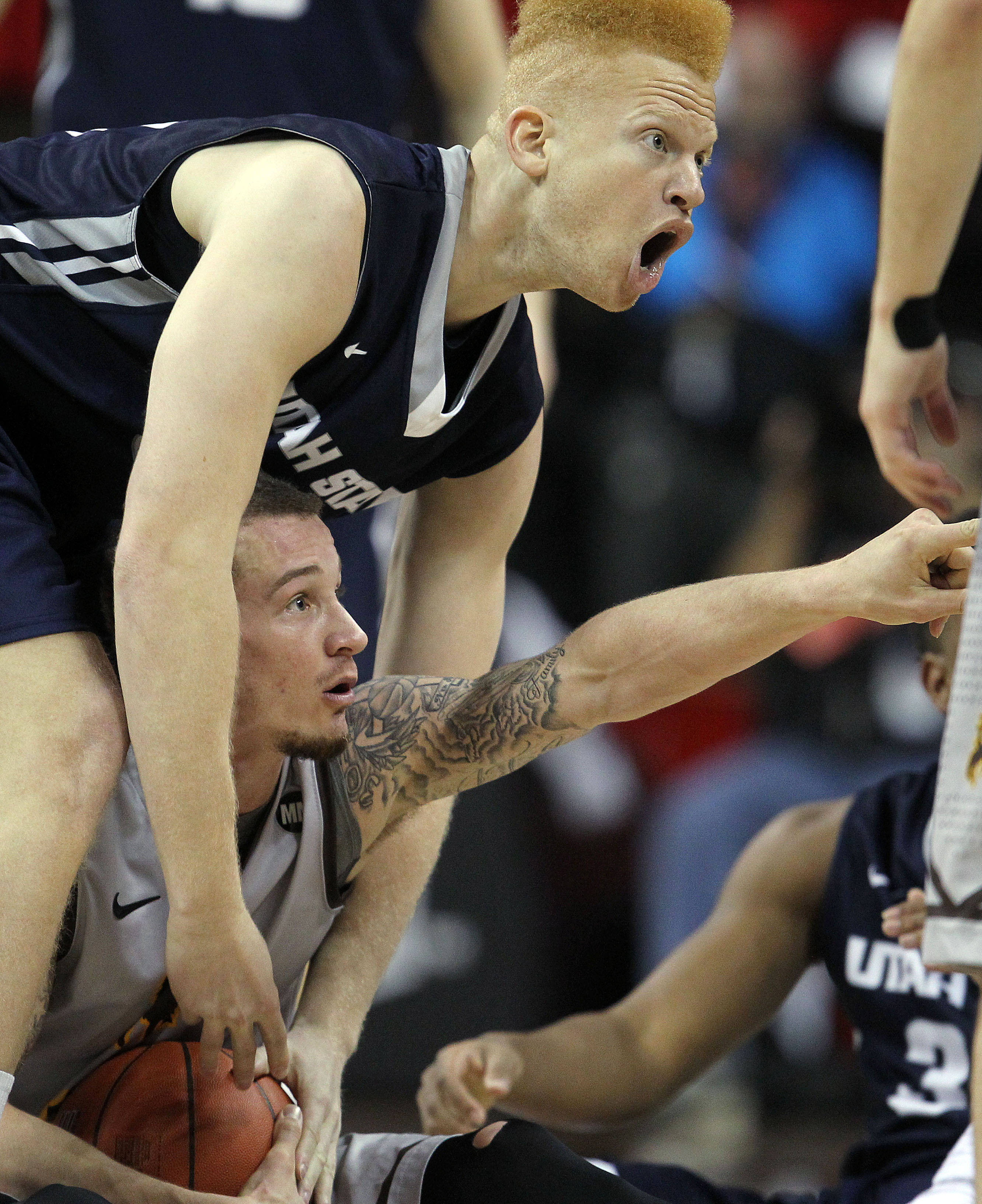 Wyoming knocks off Utah State 67-65 at Mountain West tourney