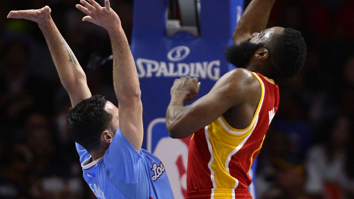 Rockets hang on to beat Clippers 100-98