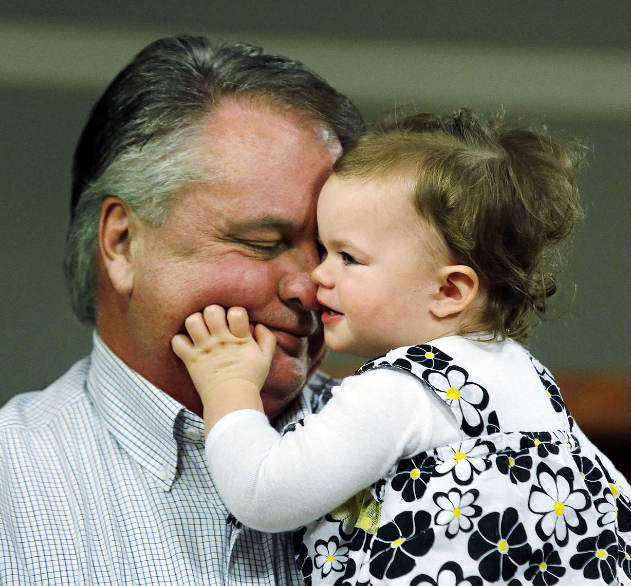 Chad Groesbeck holds his granddaughter, Lily, during an interview in Salt Lake City, Monday, March 16, 2015. The 18-month-old survived 14 hours trapped in a car upside down in the Spanish Fork River. (Photo: Ravell Call, Deseret News)