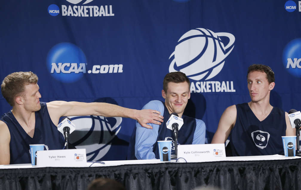 BYU's Tyler Haws (3), Kyle Collinsworth (5) and Skyler Halford (23) answer media questions prior to practice for their upcoming NCAA Tournament game against the Mississippi Rebels in Dayton, Ohio Monday, March 16, 2015. (Photo: Jeffrey D. Allred, KSL)