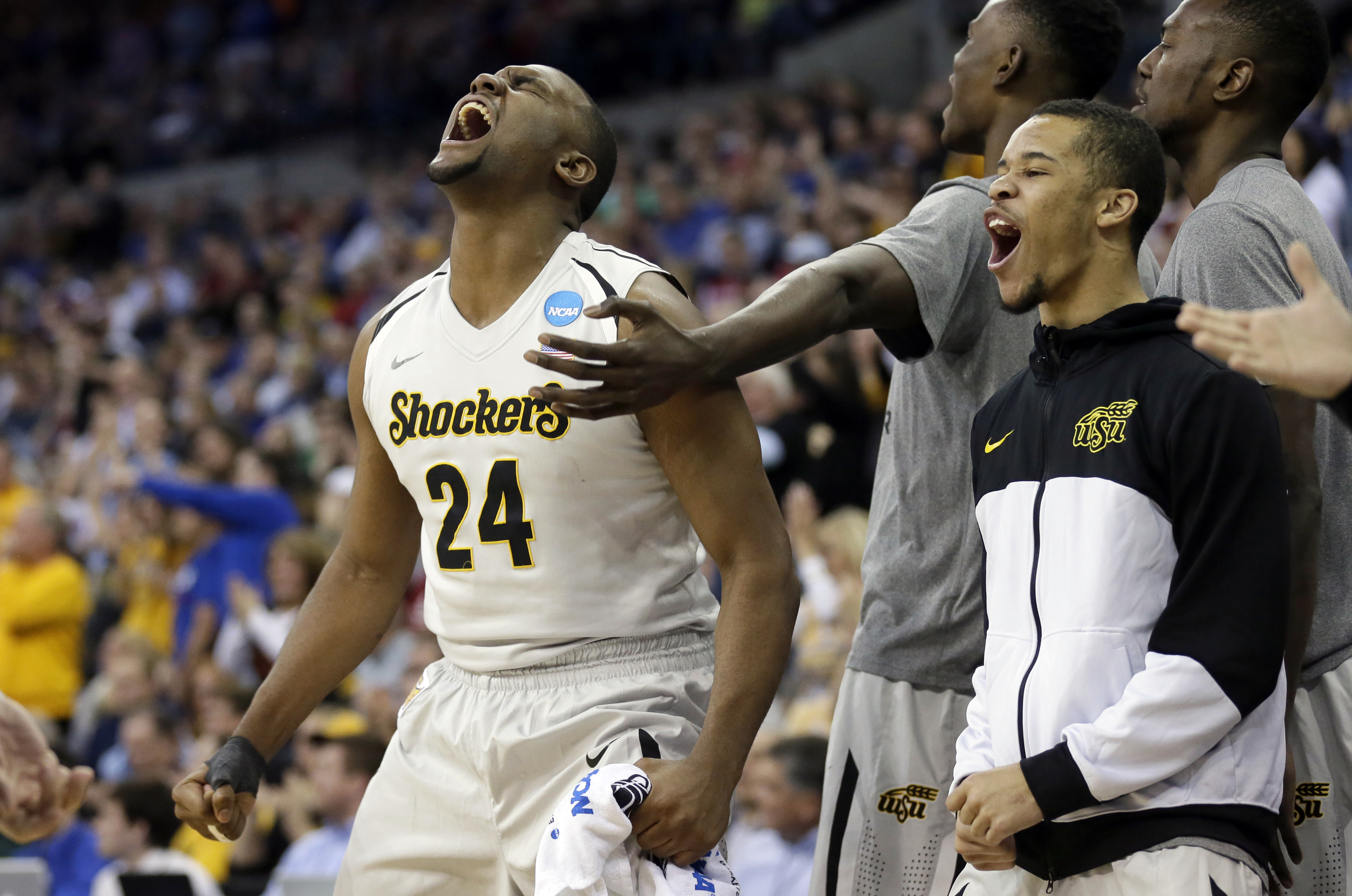 Wichita State forward Shaquille Morris (24) celebrates on the bench with teammates during the second half of an NCAA tournament college basketball game against Indiana in the Round of 64, Friday, March 20, 2015, in Omaha, Neb. RSL goalkeeper coach Daryl Shore grew up a die-hard Shockers fan after his father coached in Wichita from 1978-86. (AP file photo)
