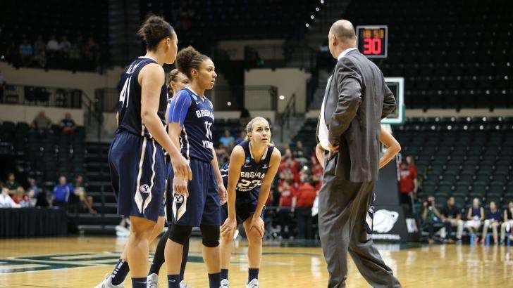 Head coach Jeff Judkins speaks with the BYU women's basketball team during an NCAA tournament first-round game against No. 3-seed Louisville on Saturday in Tampa, Florida. (Mark Philbrick/BYU Photo)