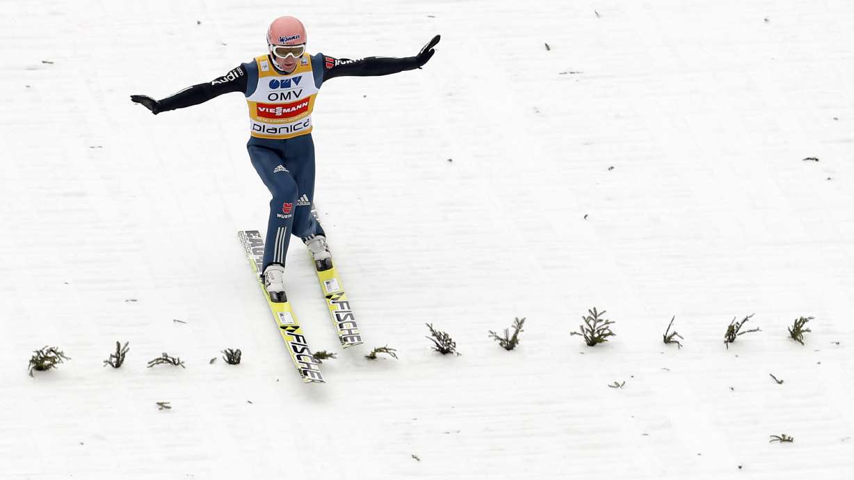 Freund wins overall ski jump World Cup by tiebreaker