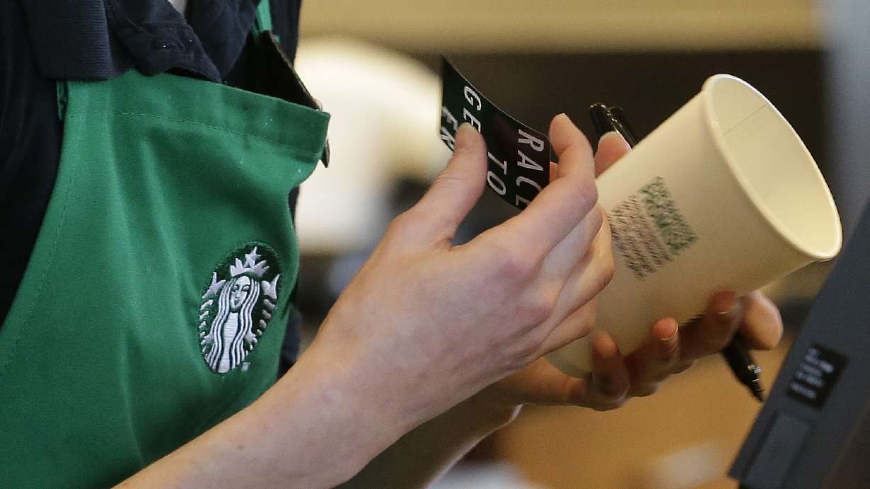 Starbucks baristas stop writing 'Race Together' on cups