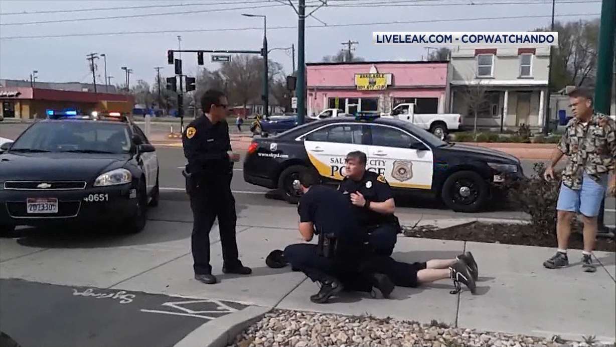 A video of a man detaining another man at gunpoint along a busy Salt Lake City street was going viral online Monday, as police explained the complicated details behind it and why nobody was arrested following the ordeal. (Photo: Courtesy Liveleak.com)