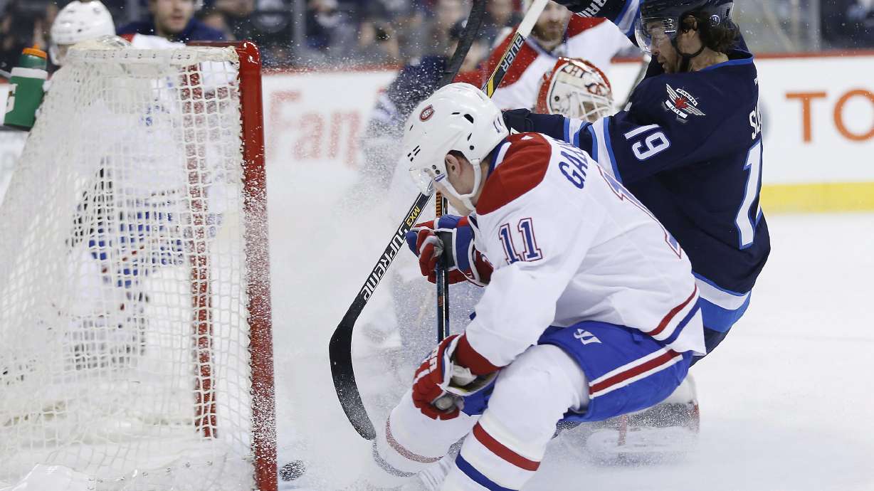 Pavelec stops 39 shots to lead Jets past Canadiens, 5-2