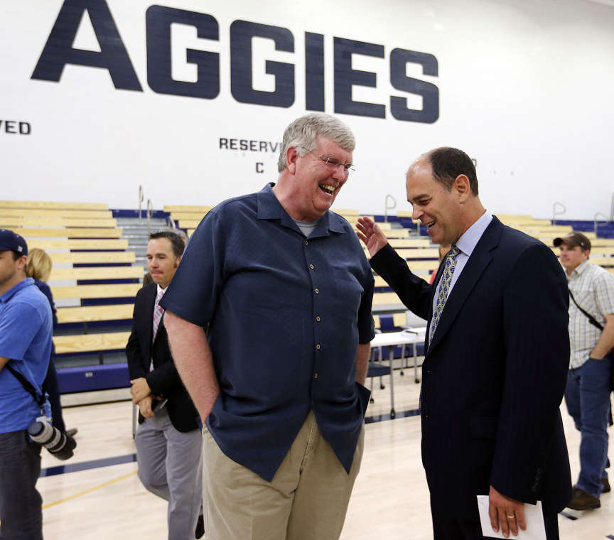 Former Utah State University Basketball Coach Stew Morrill, left, greets new USU Head Basketball Coach Tim Duryea in Logan, Monday, March 30, 2015. (Ravell Call/Deseret News)