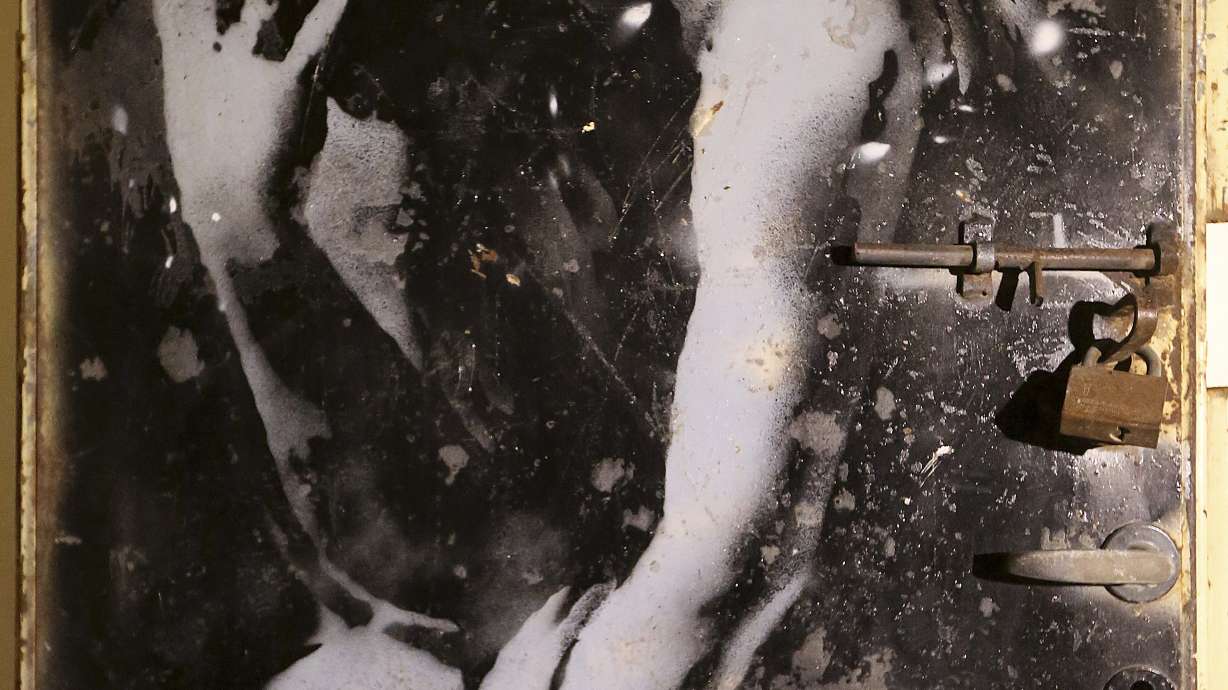 Gaza artist gobbles up valuable Banksy mural on war debris