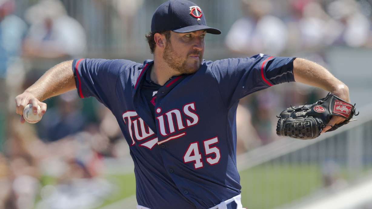 Hughes, Buchholz look sharp in Twins-Red Sox 4-4 tie