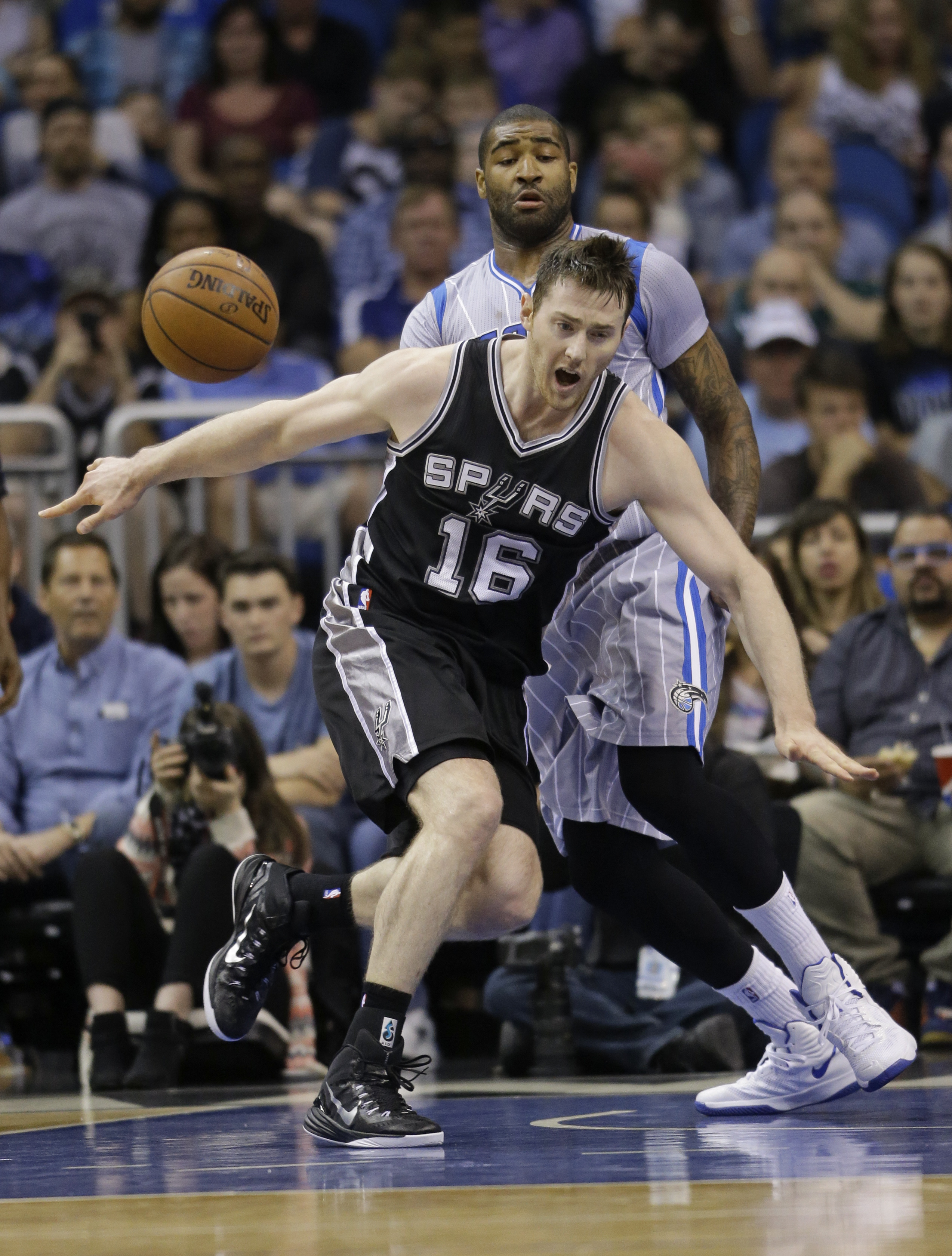 Spurs secure playoff berth with 103-91 win over Magic