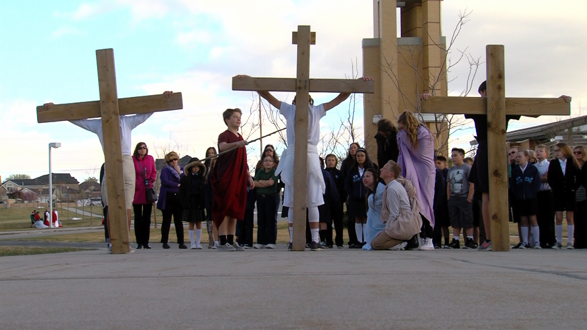 Eighth-graders at St. John the Baptist Middle School prepare for Christ's passion by re-enacting the "Living Stations of the Cross" Wednesday, April 1, 2015, for students, teachers and visitors to the Skaggs Catholic Center in Draper. (Photo: KSL-TV)