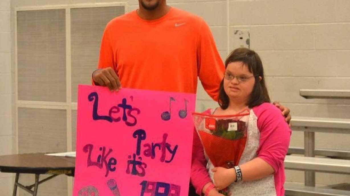 High school basketball star asks girl with Down syndrome to prom