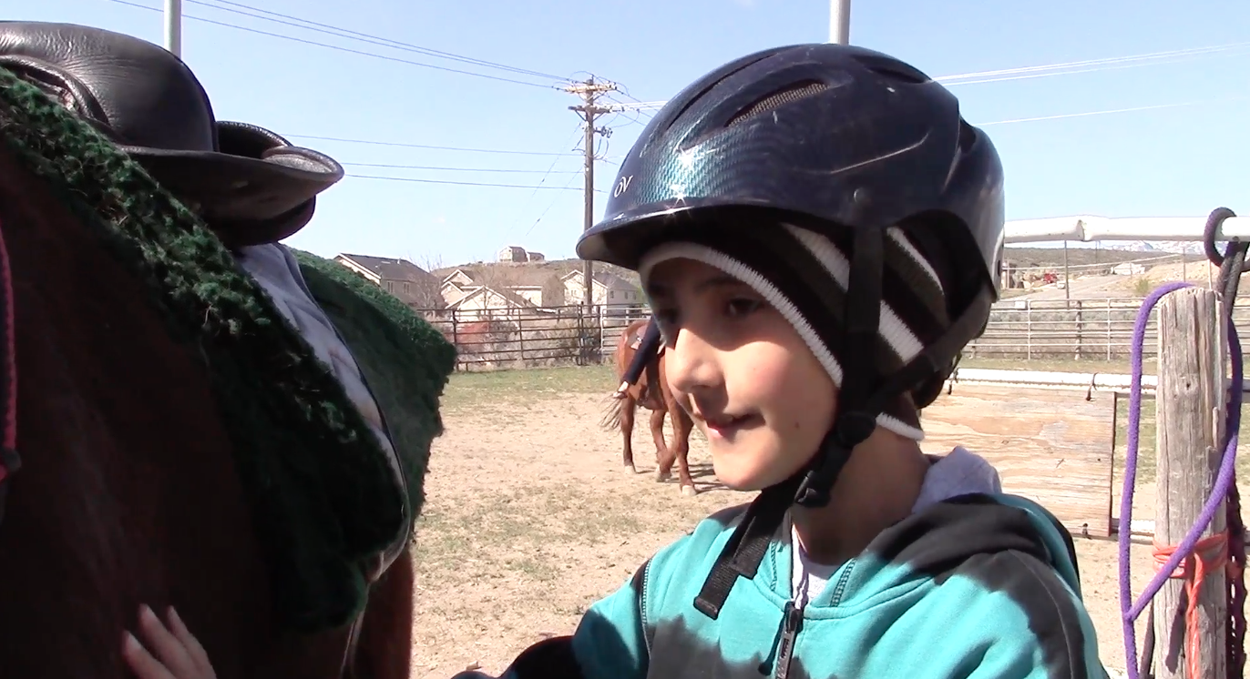 Colton Smith says he feels more connected to others because of equestrian therapy. (Photo: Jen Jacobson)