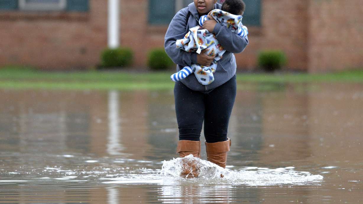 Mother, child missing in flood as storms hit South, Midwest