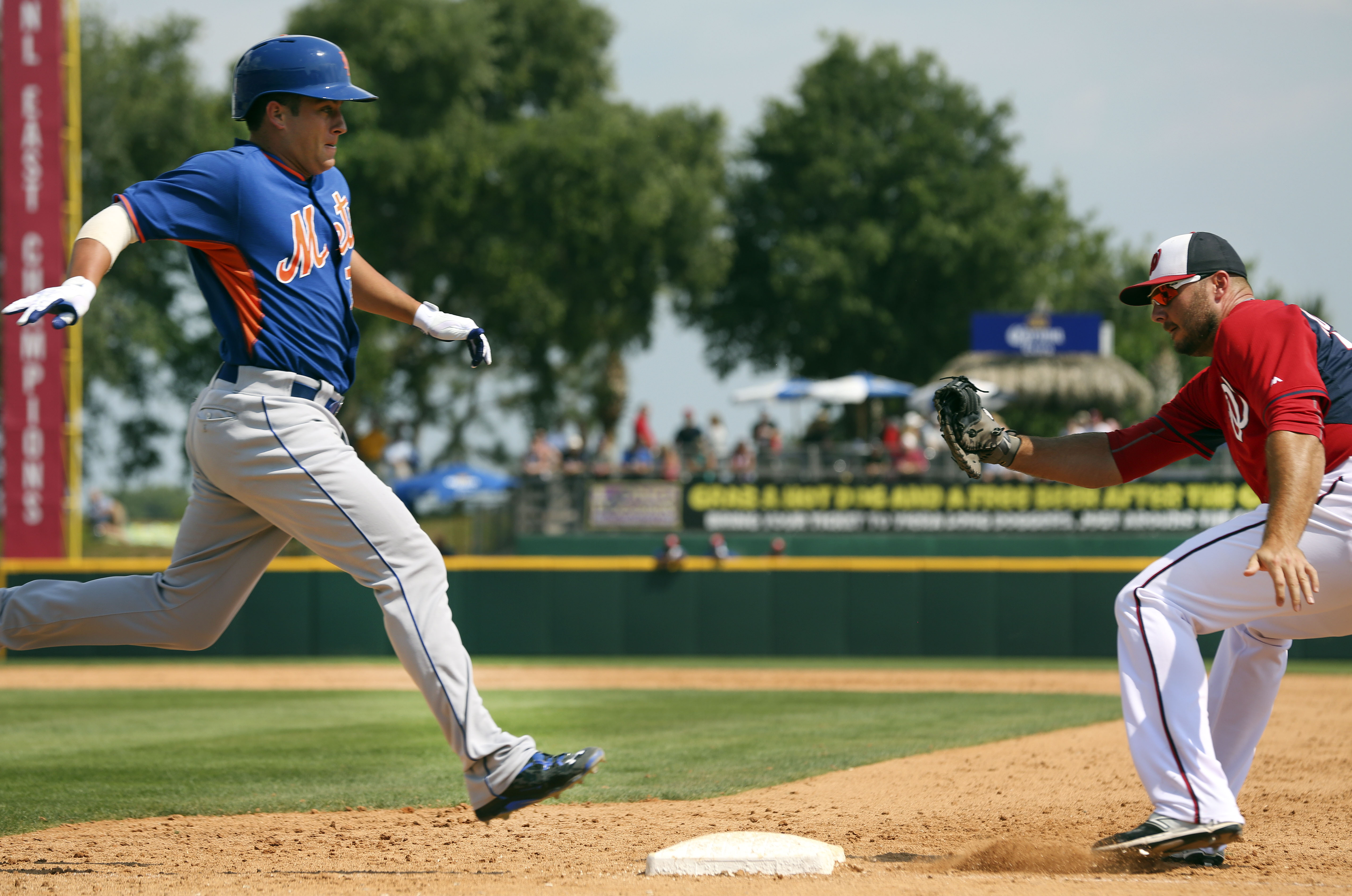 Robinson makes Nationals; Carp, Hill re-assigned to minors