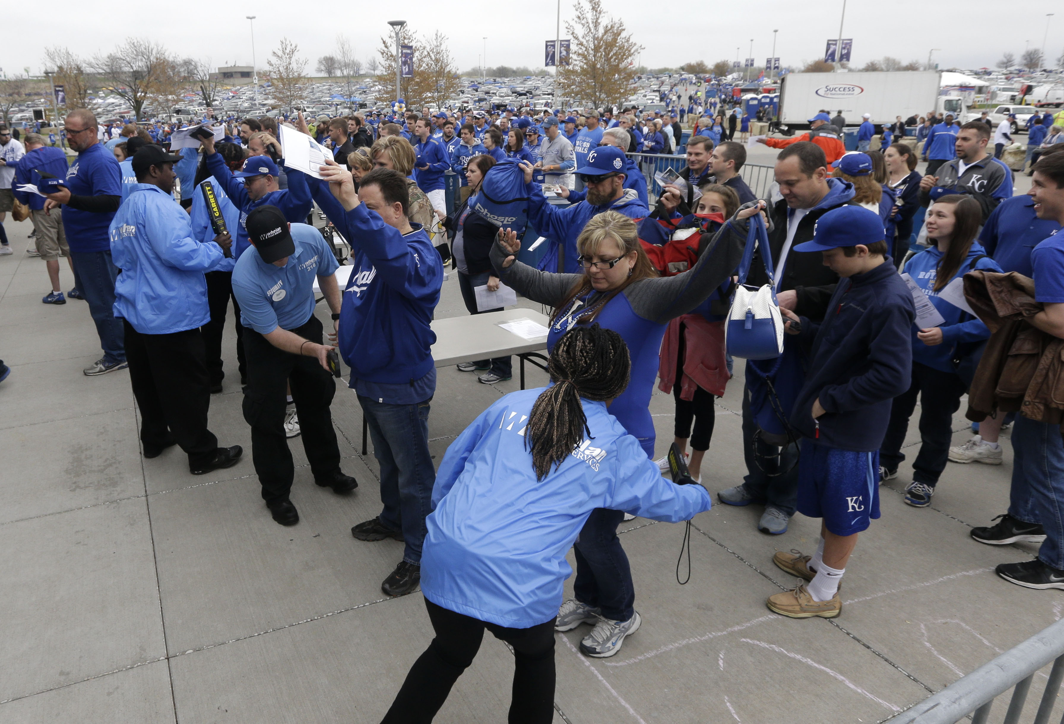 Major league ballparks beef up security with metal detectors