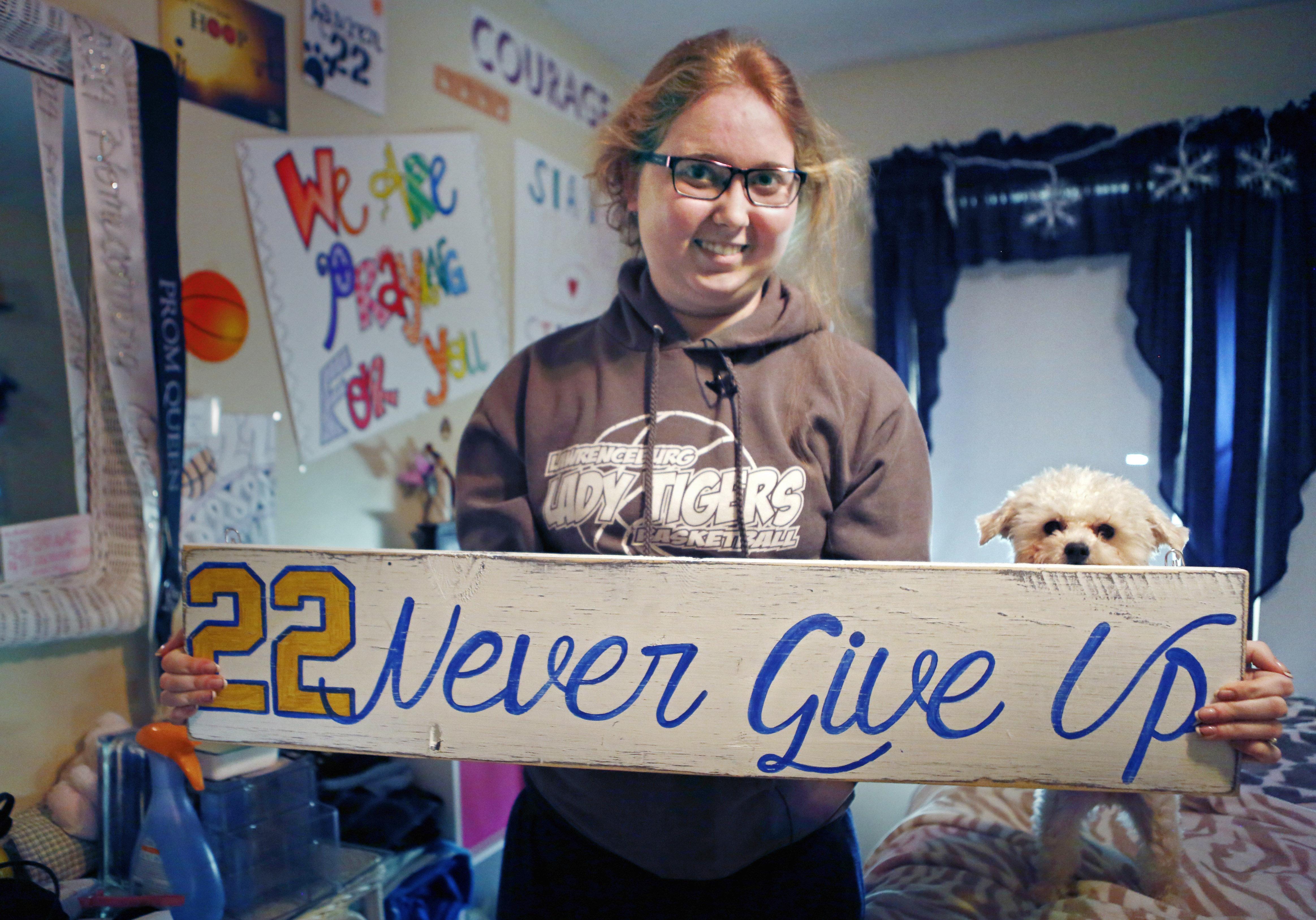 Lauren Hill's cancer leaves her weak, but still fighting