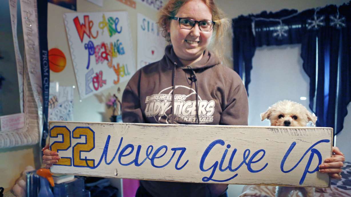 Lauren Hill's cancer leaves her weak, but still fighting