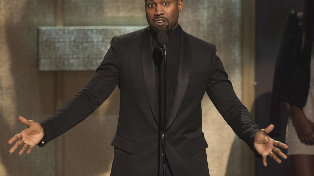 Kanye West, photographer, settle lawsuit over airport attack