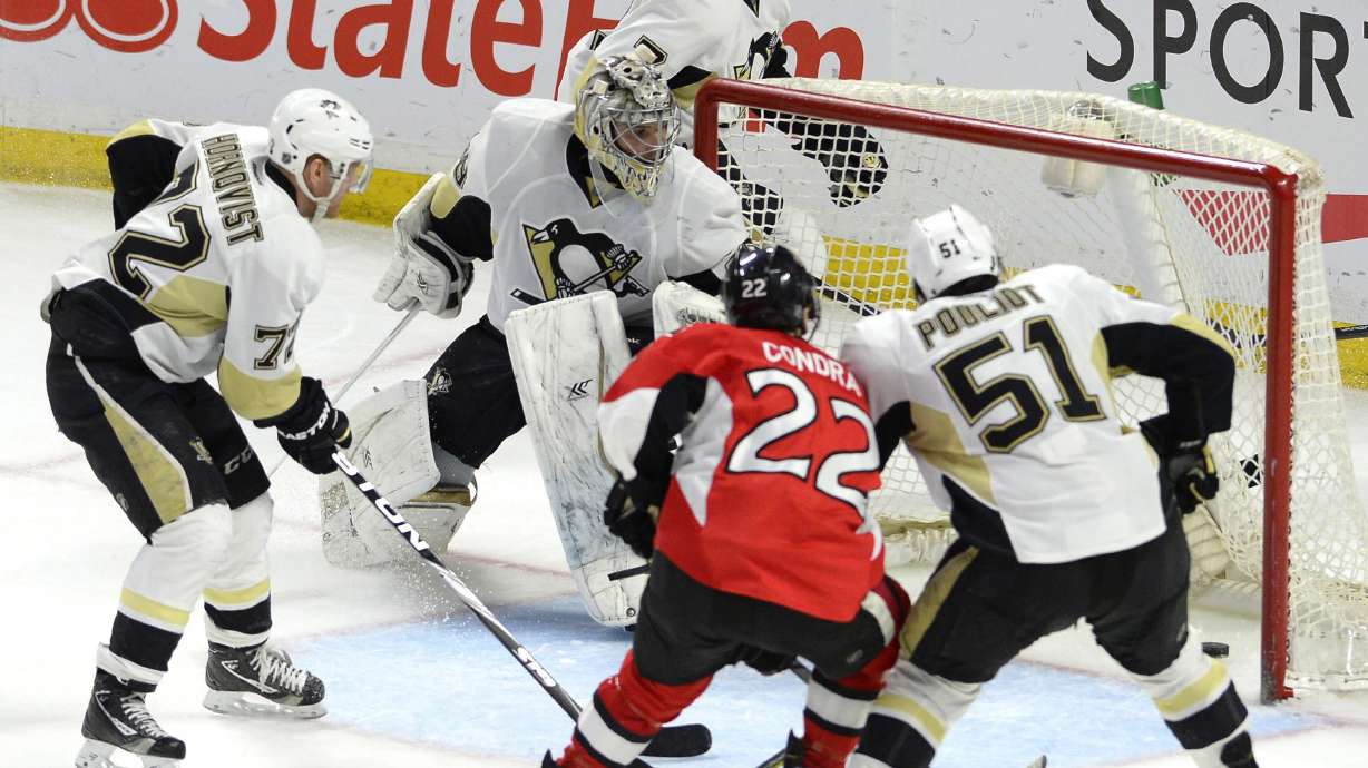 Stone scores winner in OT to lift Senators past Penguins