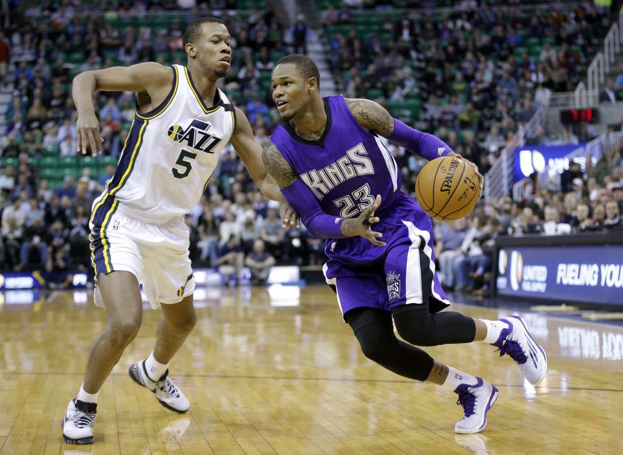 Sacramento Kings guard Ben McLemore (23) drives against Utah Jazz guard Rodney Hood (5) during the first quarter of an NBA basketball game Wednesday, April 8, 2015, in Salt Lake City. (AP Photo/Rick Bowmer)