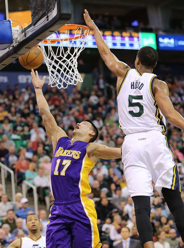 Los Angeles Lakers guard Jeremy Lin (17) puts up a lay up with Utah Jazz guard Rodney Hood (5) defending as the Jazz and the Lakers play Wednesday, Feb. 25, 2015, at EnergySolutions Arena in Salt Lake City. (Scott Winterton/Deseret News)