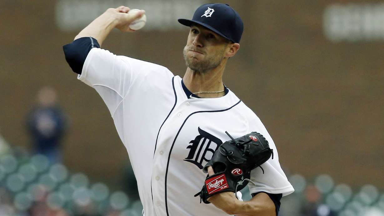 Tigers set AL shutout record to start season, beat Twins 7-1