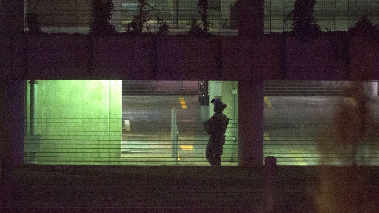 CORRECTS: Police: Man kidnapped woman, shot Census Bureau guard, led officers on chase