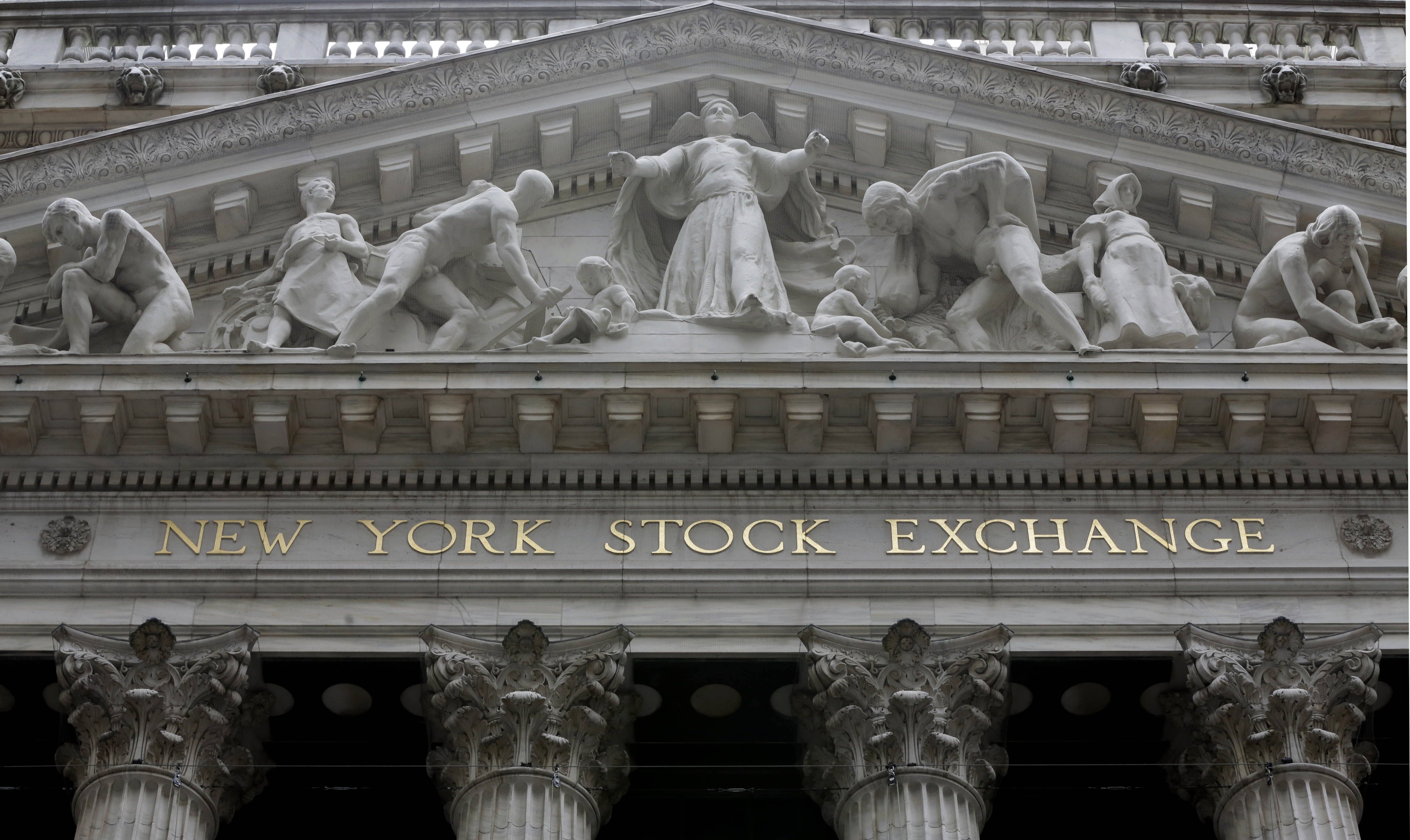 US indexes higher in midday trading; GE soars on deal news