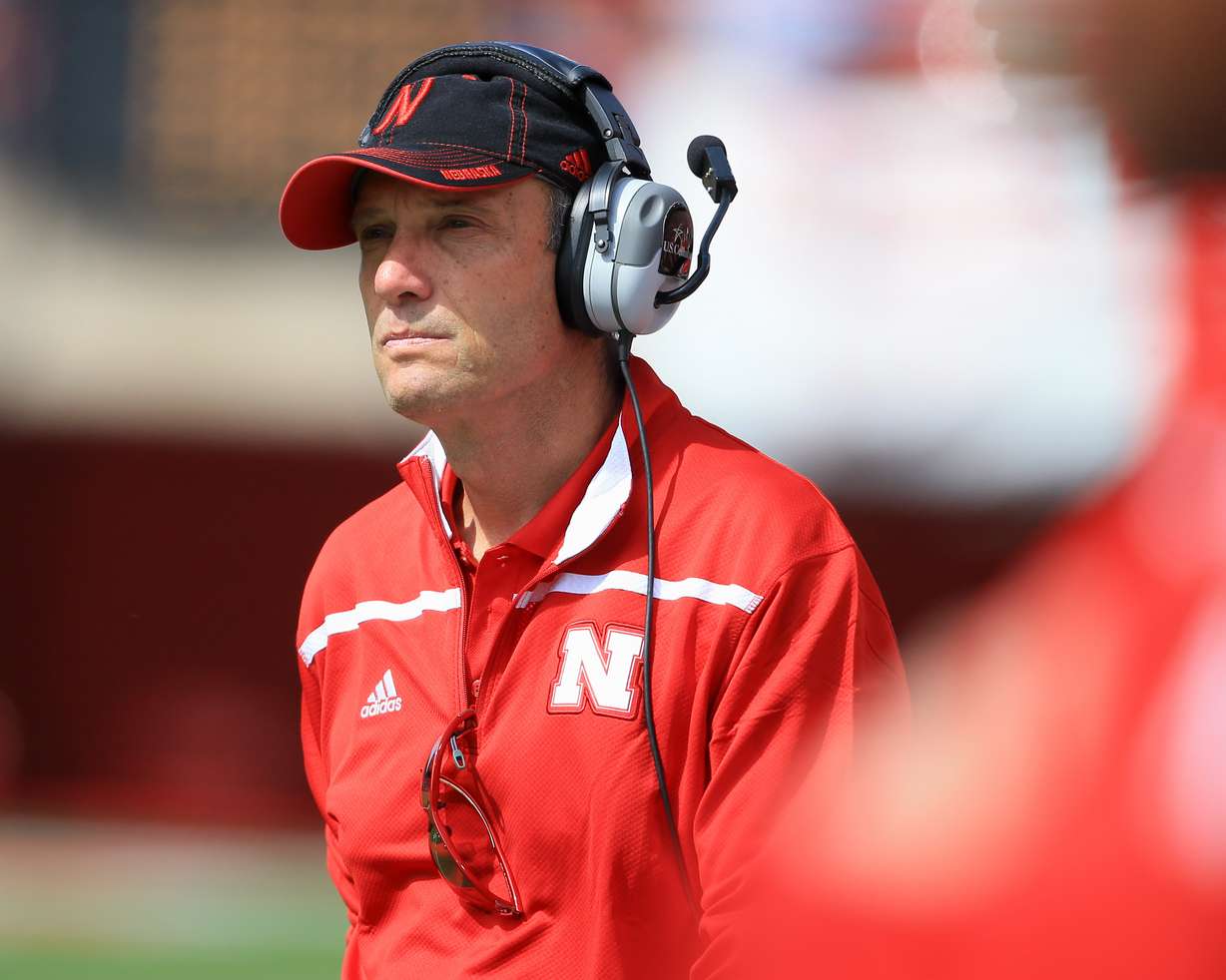 Nebraska head coach Mike Riley follows his players during the annual NCAA college football Red-White spring game in Lincoln, Neb. on April 11, 2015. (AP Photo/Nati Harnik)