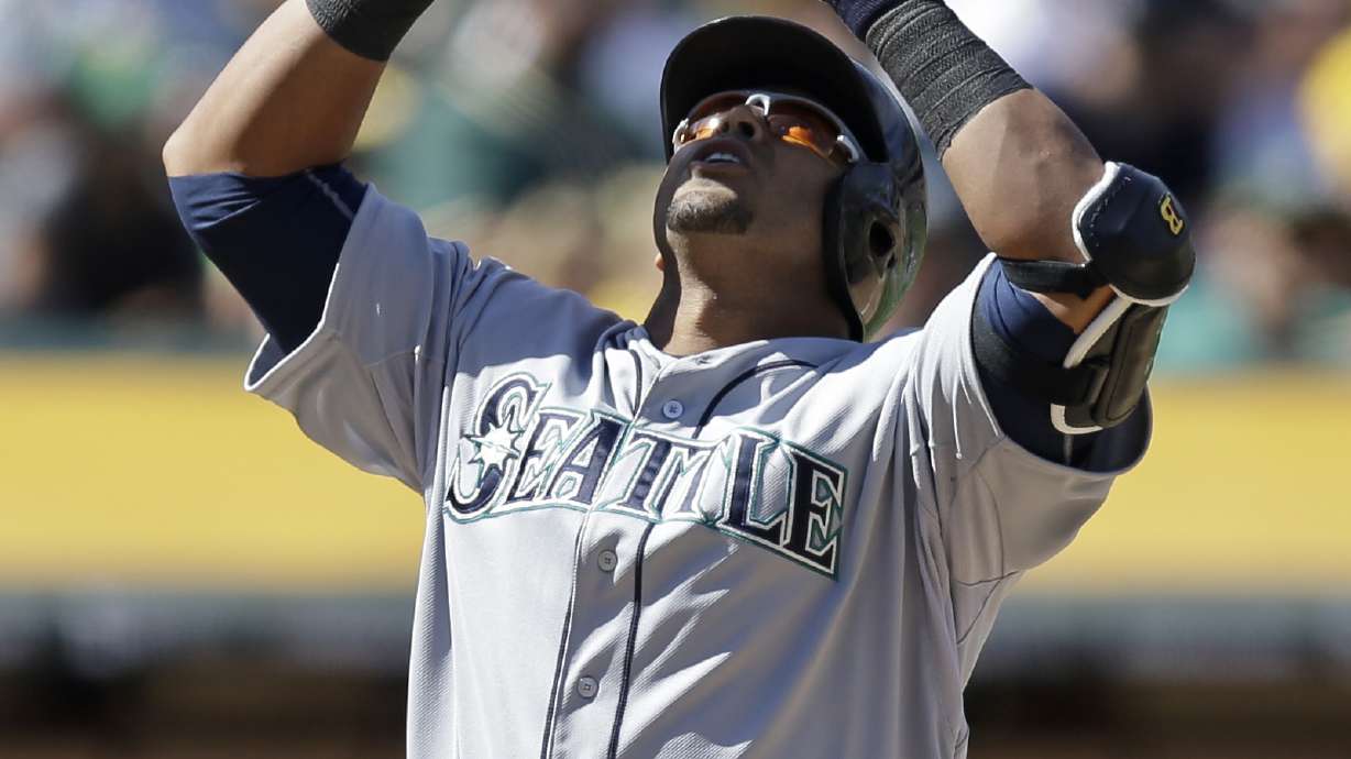 Cruz hits 1st Mariners' homer in 5-4, 11-inning win over A's