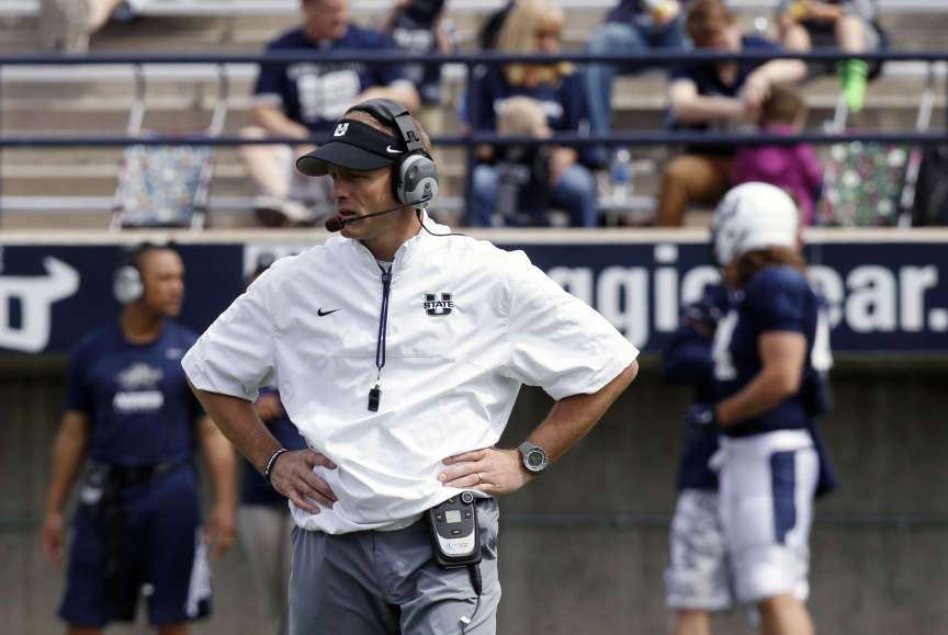 Utah State coach Matt Wells watches as the Aggies scrimmage at Maverik Stadium at Utah State University on April 11, 2015. (Photo: Chelsey Allder/Deseret News)
