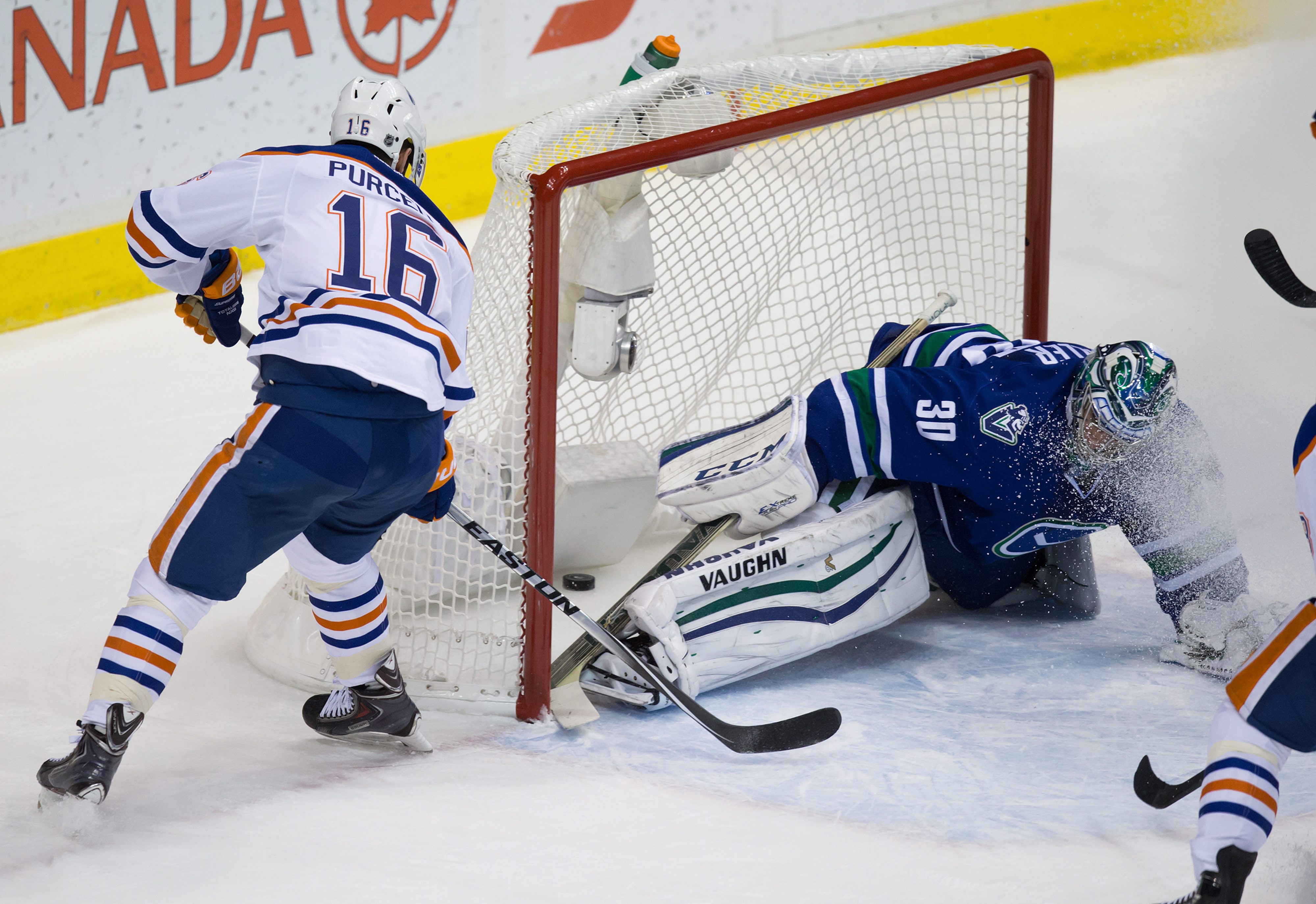 Edler scores in OT to lift Canucks past Oilers in finale