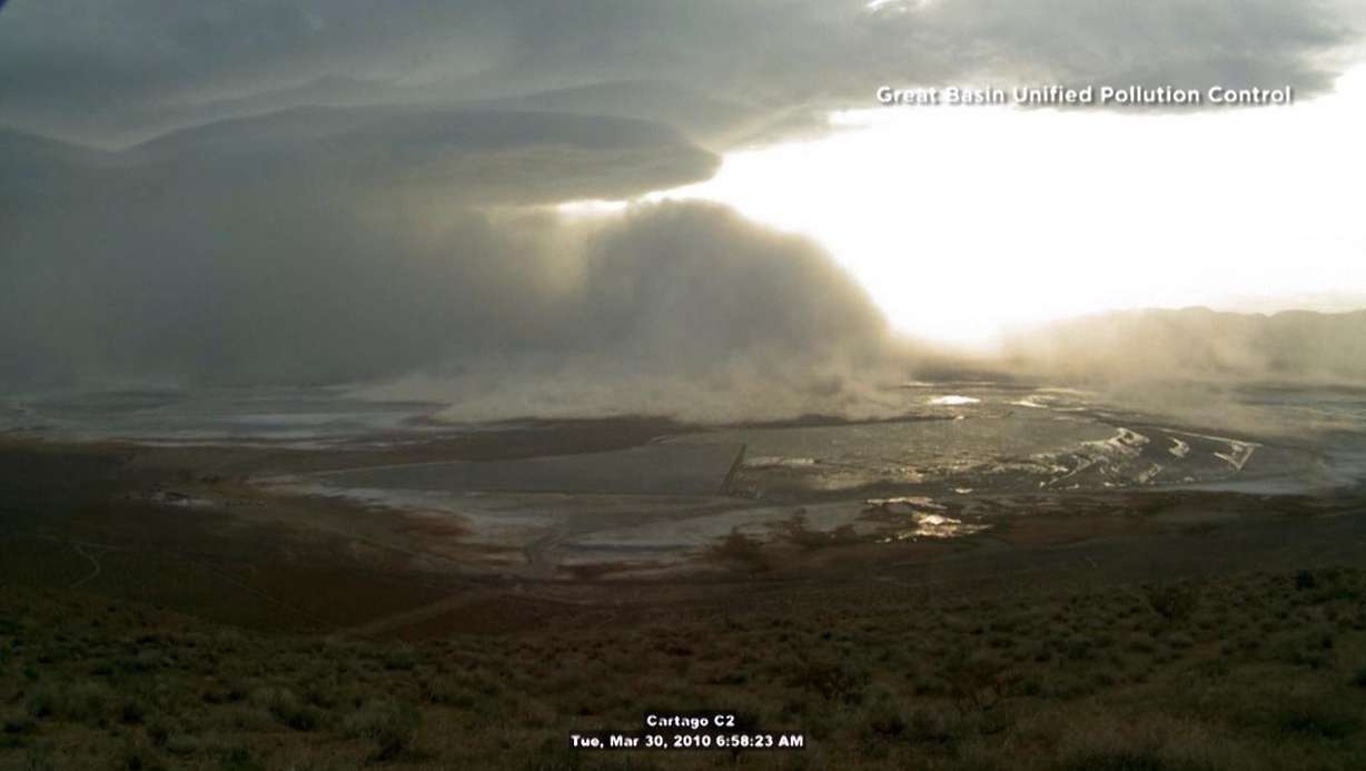 Enormous dust storms are generated by Owens Lake in Southern California, which is the biggest source of PM-10 in the nation. For most of the last century, Los Angeles completely dried up the lower stretch of the Owens River, choking off the water supply to Owens Lake. Under court order, L.A. has been fixing the dust problem, by watering the dry bed, growing salt grass, covering it with gravel and other methods. (Photo: Great Basin Unified Pollution Control Dist.)