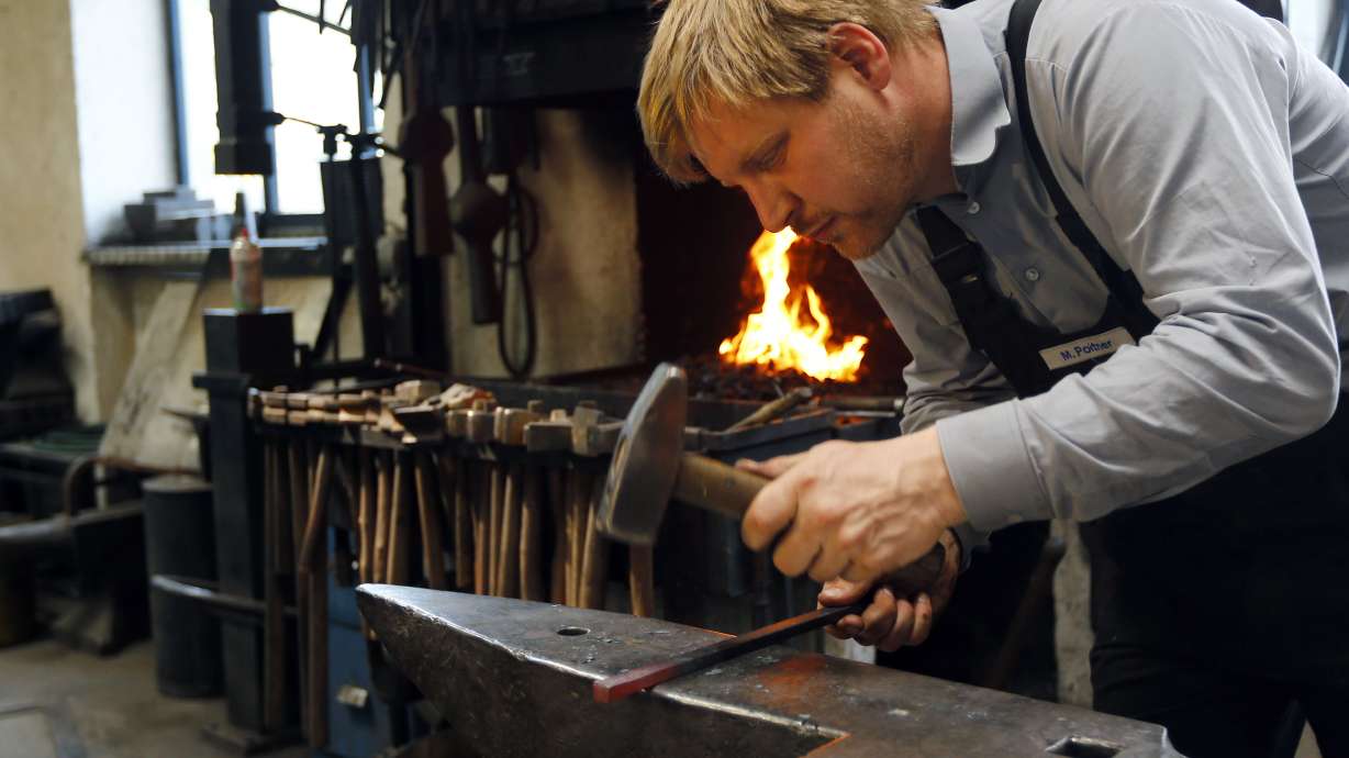 Blacksmith creates replica of stolen Dachau camp gate