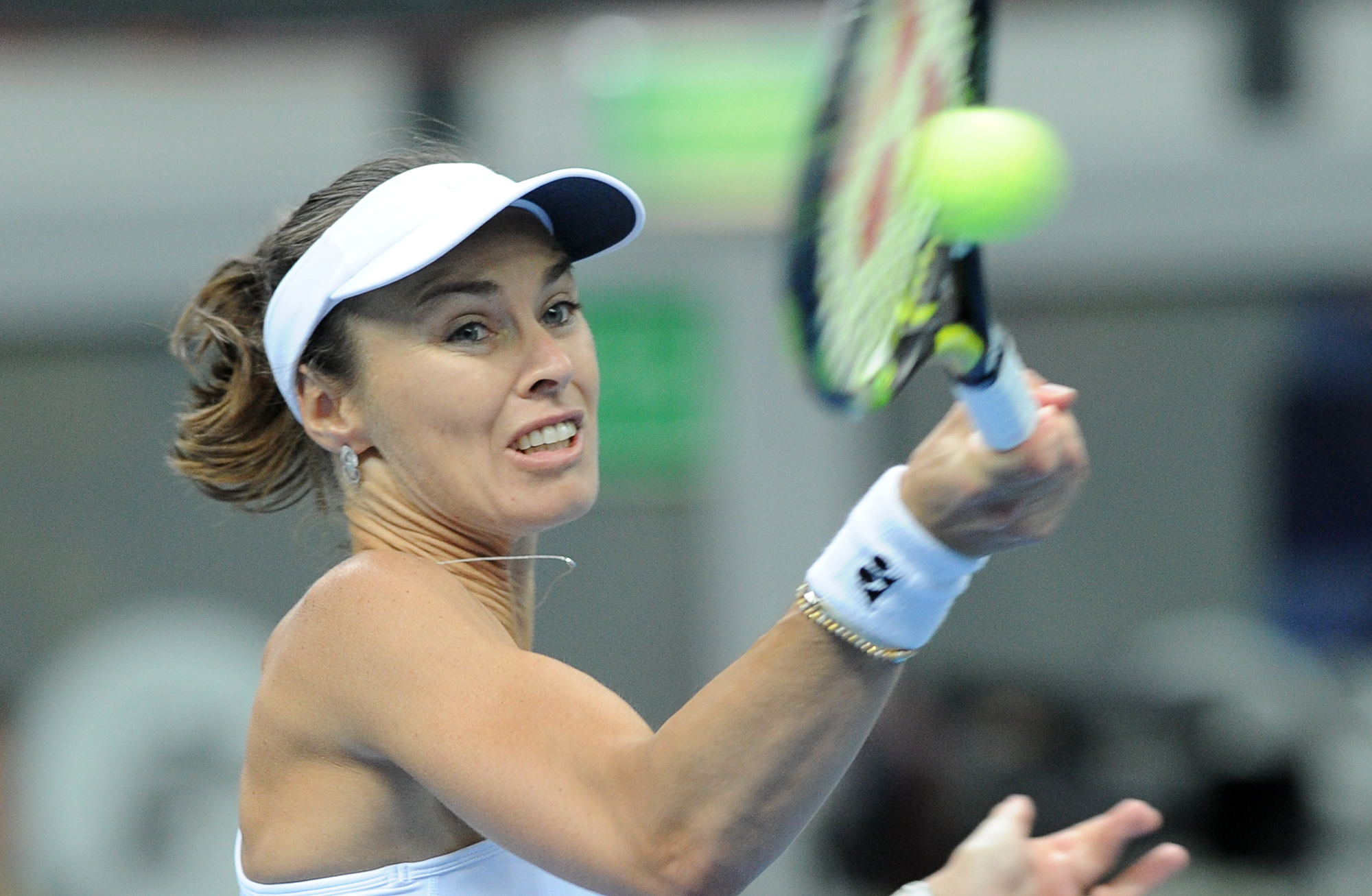 Losing return for Hingis in Fed Cup playoffs