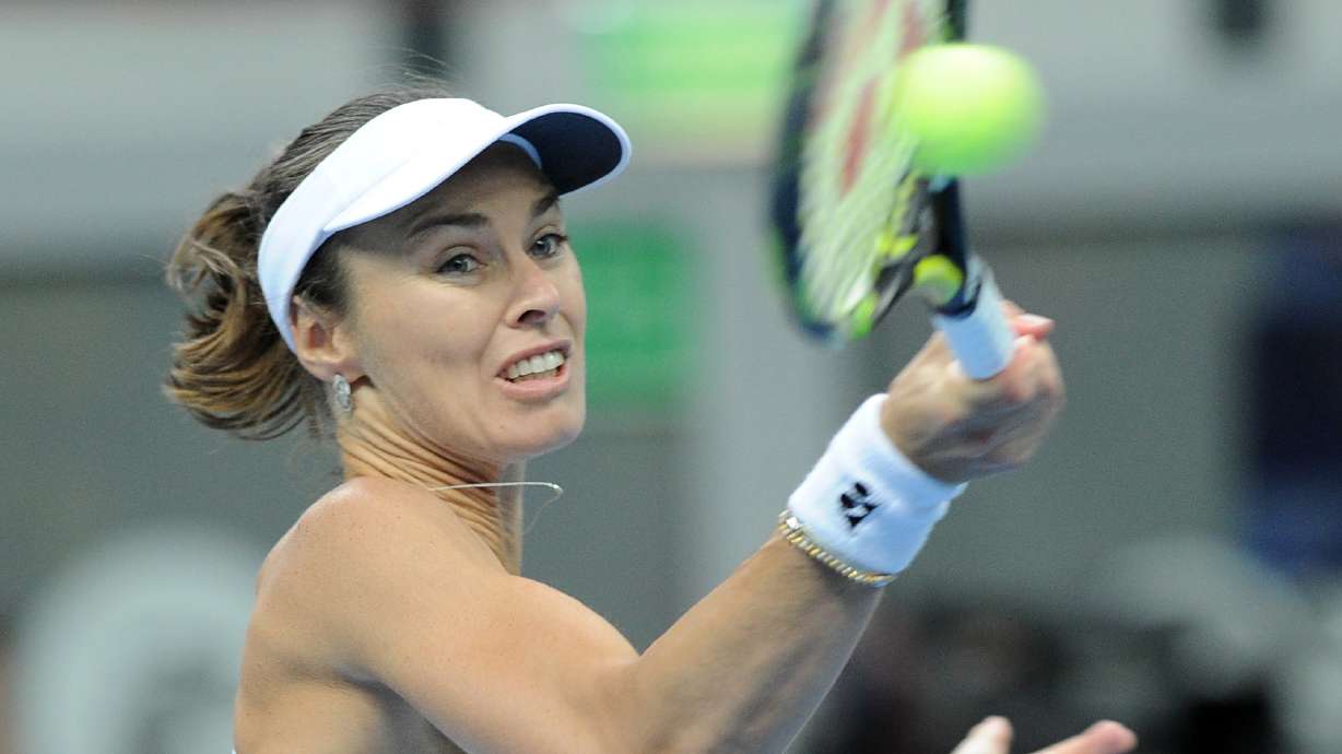 Losing return for Hingis in Fed Cup playoffs