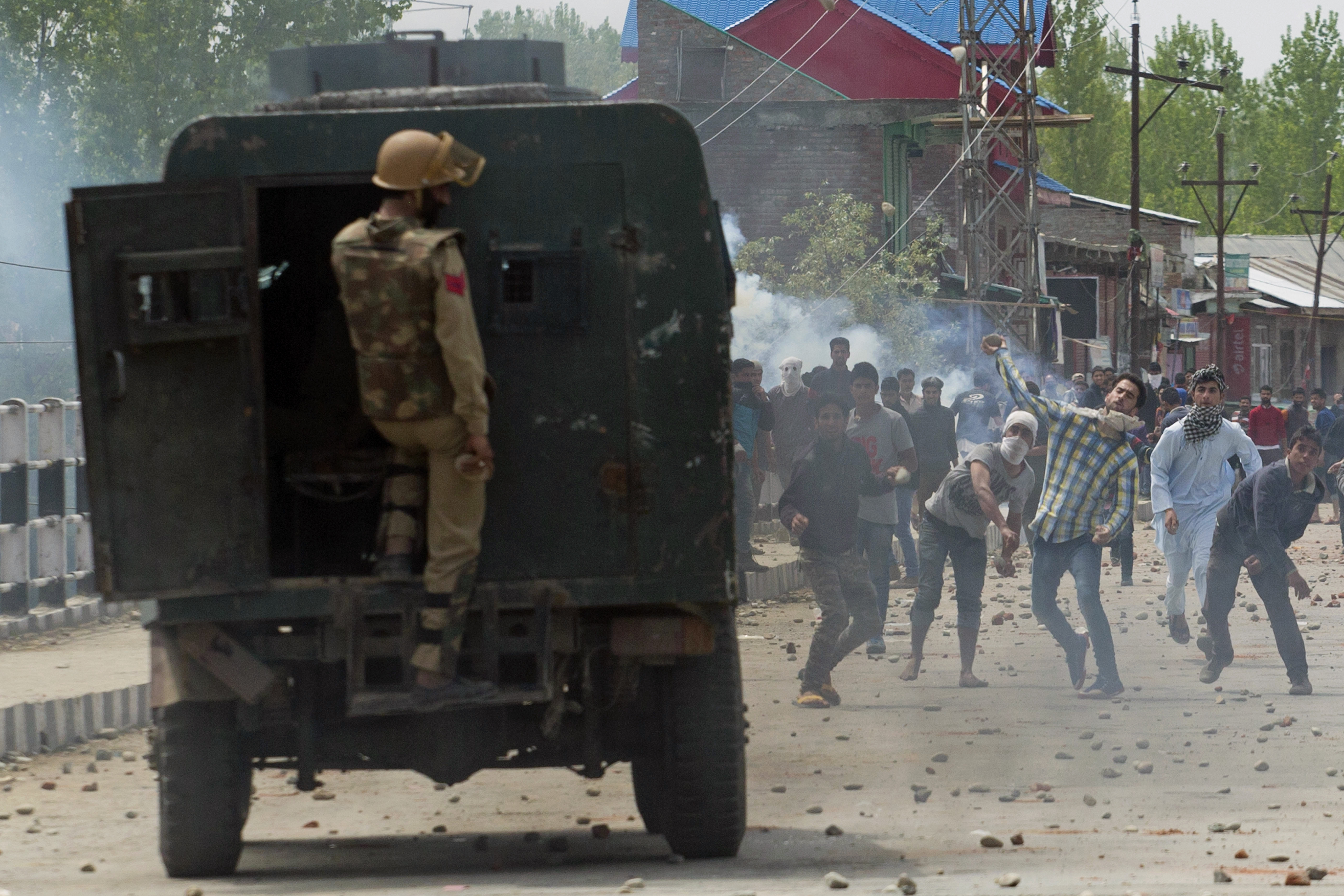 2 Indian policemen arrested in killing of Kashmiri youth