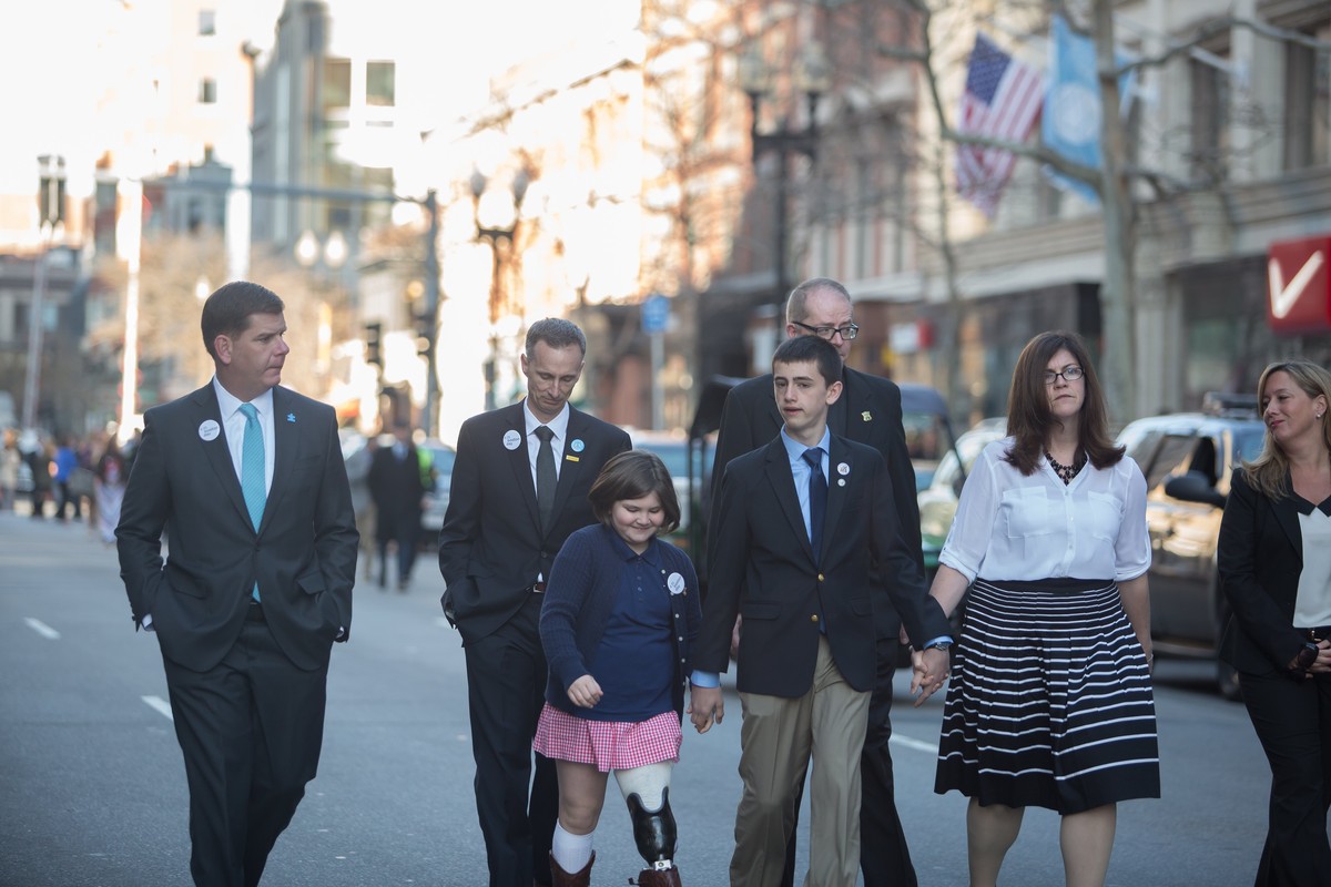 Mayor Marty Walsh unveiled a banner with the help of the Richard family to kick off the "One Boston Day", an annual tradition to celebrate the resilency, generosity, and strength of the people that make Boston the great city it is. (Photo: Dingfang Zhou/BU News Service/CNN)