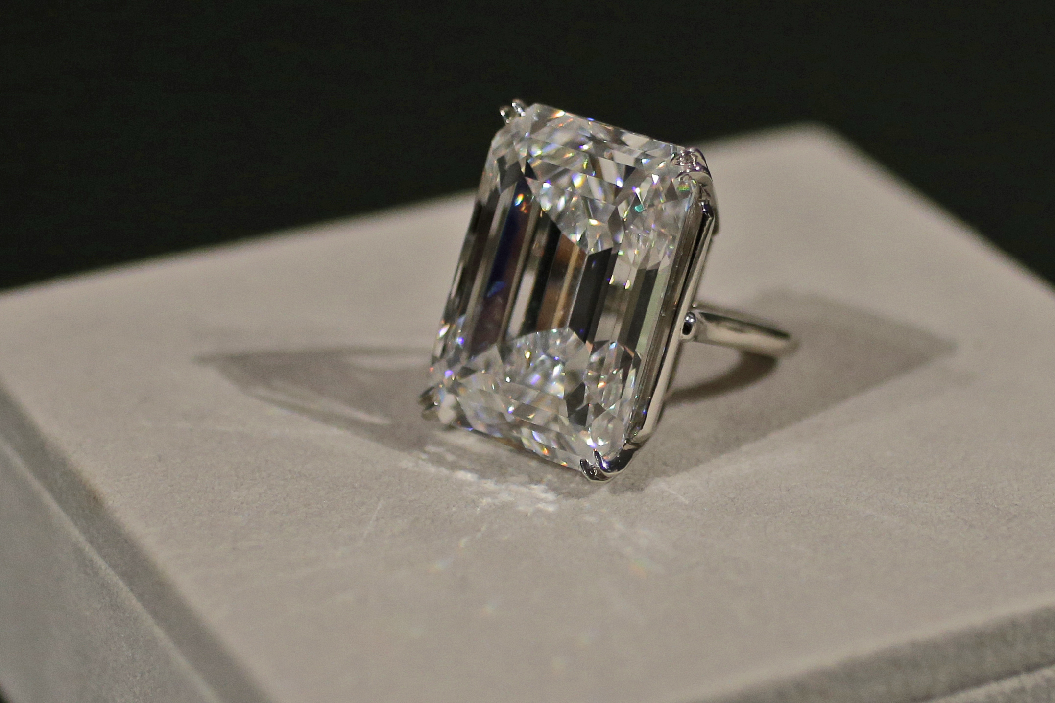 A 100-carat emerald-cut diamond is on display at Sotheby's, Friday, April 17, 2015, in New York. The "perfect" 100-carat diamond in a classic emerald cut is going on the auction block, where it could fetch between $19 million to $25 million. Sotheby's will offer the white diamond on April 21, in New York. (AP Photo/Mary Altaffer)