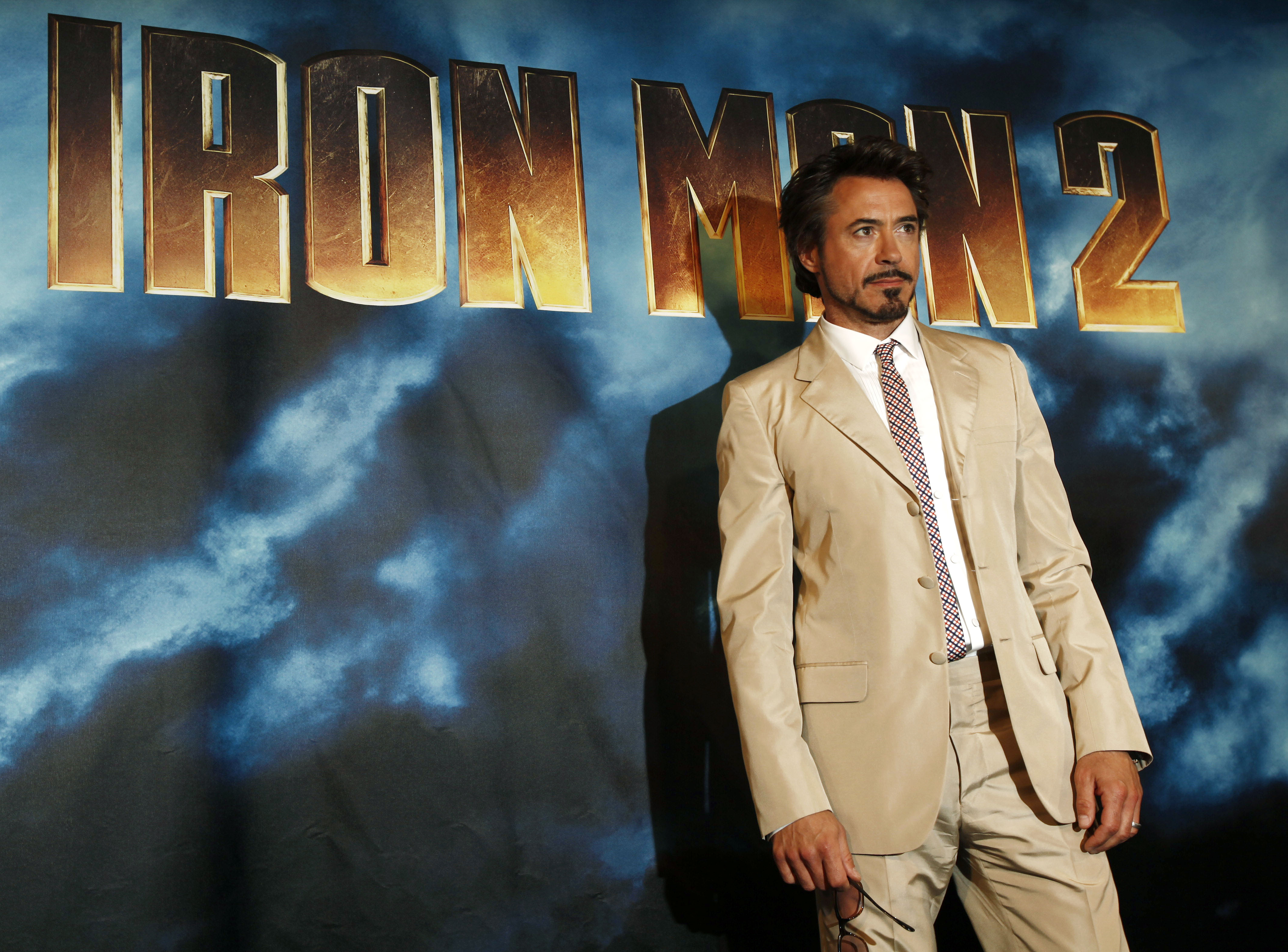 Actor Robert Downey Jr. poses for photographers during a photo call for the upcoming film "Iron Man 2" in Los Angeles on Friday, April 23, 2010. (AP Photo/Matt Sayles)