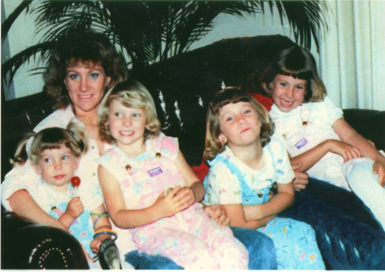 Judi Dinkins sits with her daughters, Emily, Charity, Camilla and Amanda, in an undated photo provided by the family. Now adults, Dinkins' daughters say their mother was raped and beaten by their father, Virsel Jay "VJ" Daley. They also allege that Daley sexually abused them as children. Daley was charged April 17, 2015, in 4th District Court with kidnapping, rape, forcible sodomy and assault for an alleged attack on another woman. (Photo: Dinkins family)