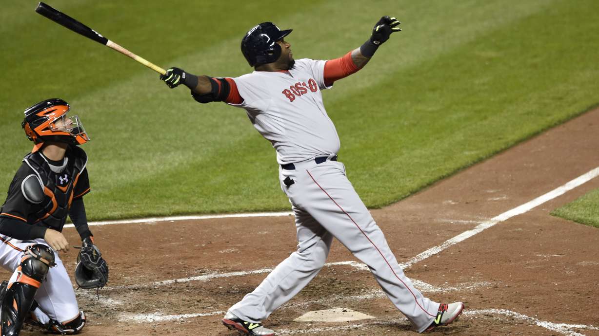 Holt's 8th-inning HR lifts Red Sox past skidding Orioles 7-5