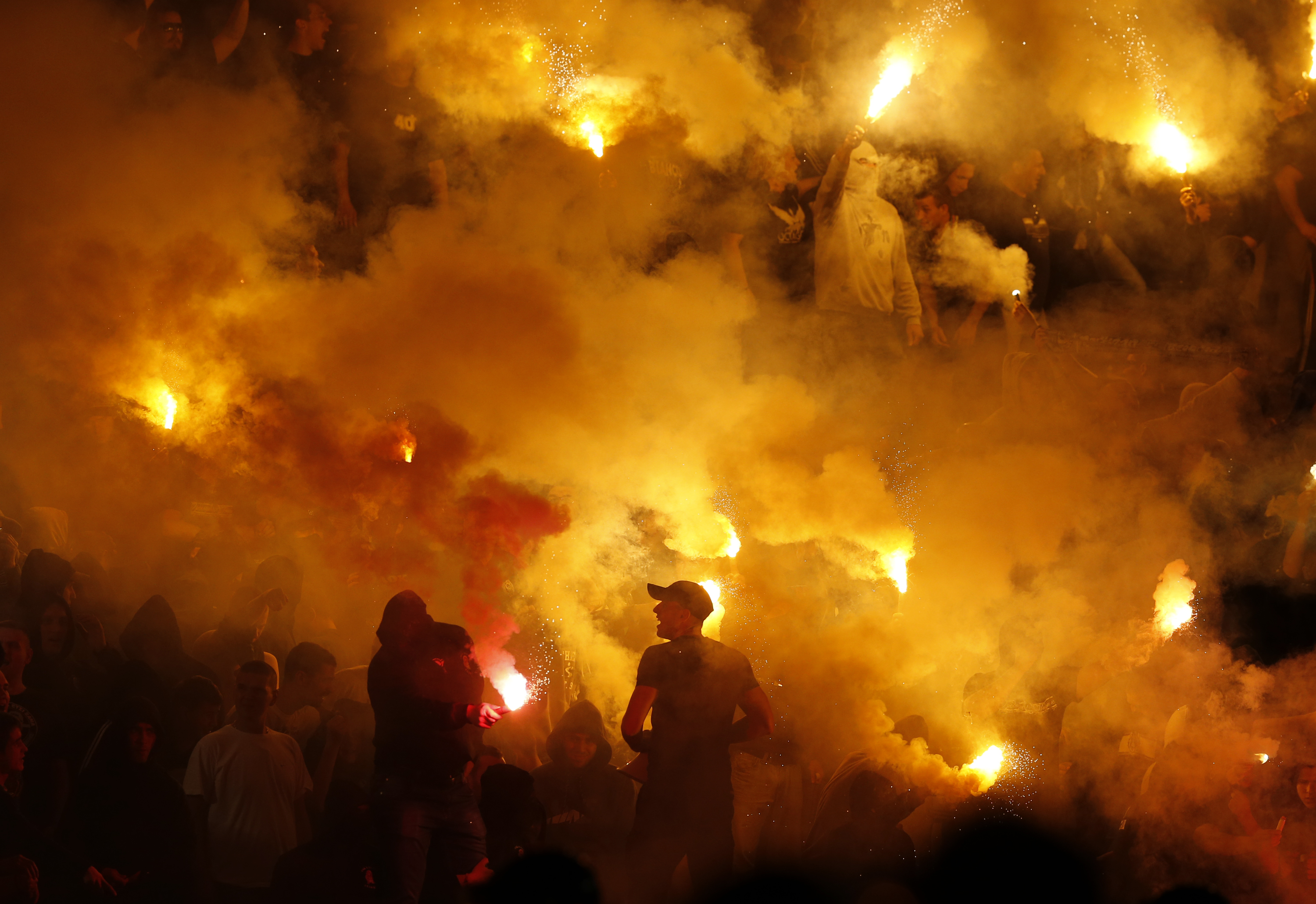 Dozens injured, arrested after soccer riots in Serbia