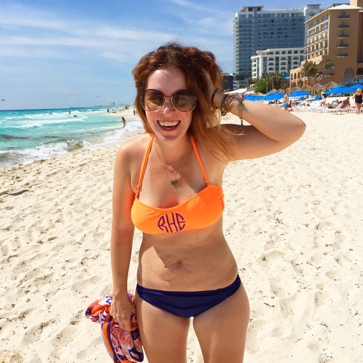 This March 21, 2015 photo released by Rachel Hollis shows Hollis on the beach in Cancun, Mexico. An Instagram campaign started months ago by moms Alex Elle, a writer, and Erika Layne Salazar, a photographer, dubbed Love Your Lines urges women to show off their stretch marks. (Rachel Hollis via AP)
