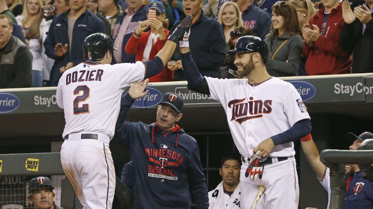 Twins rough up Sale in 12-2 victory
