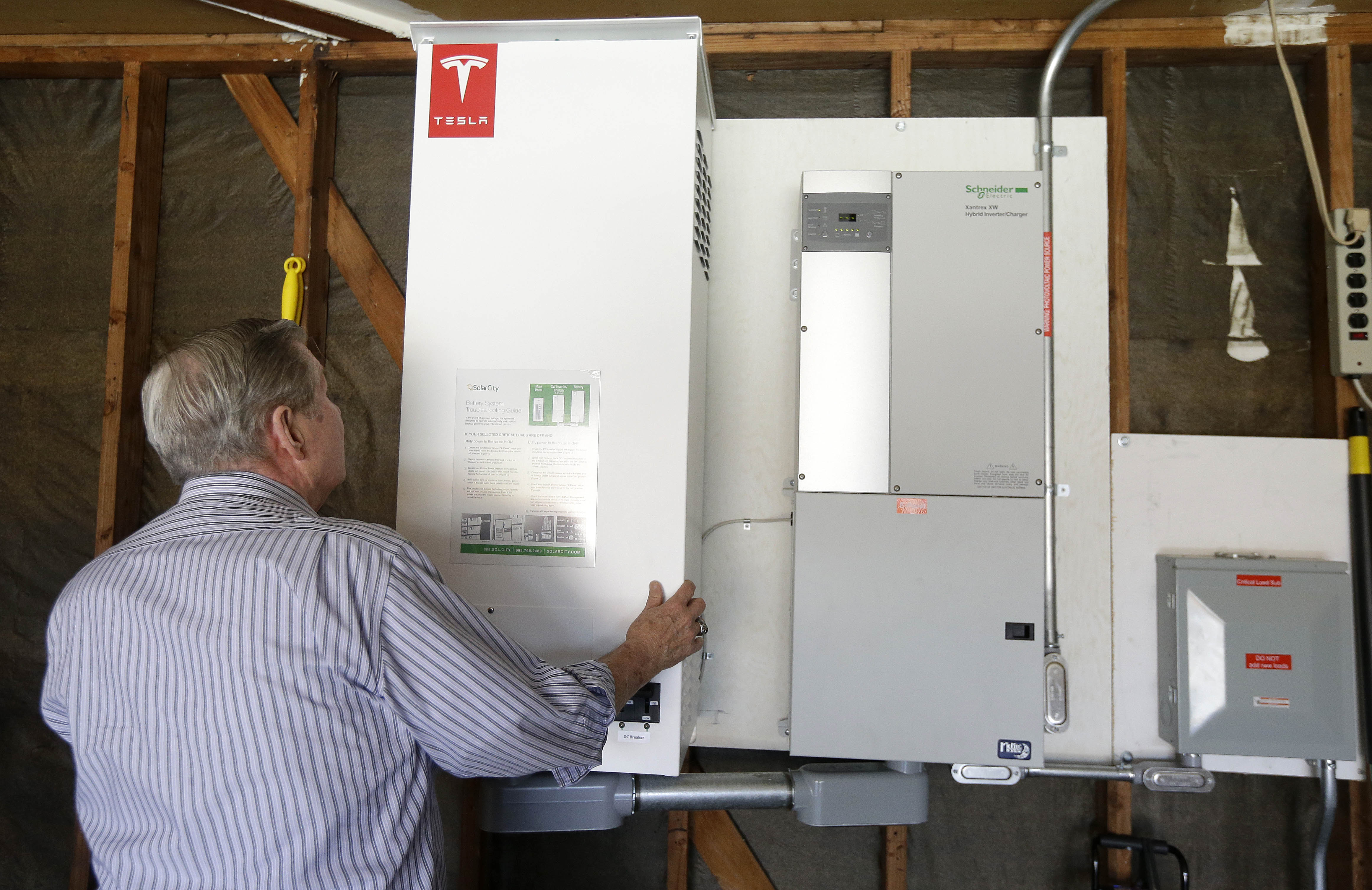 Tesla charges into home battery market despite challenges