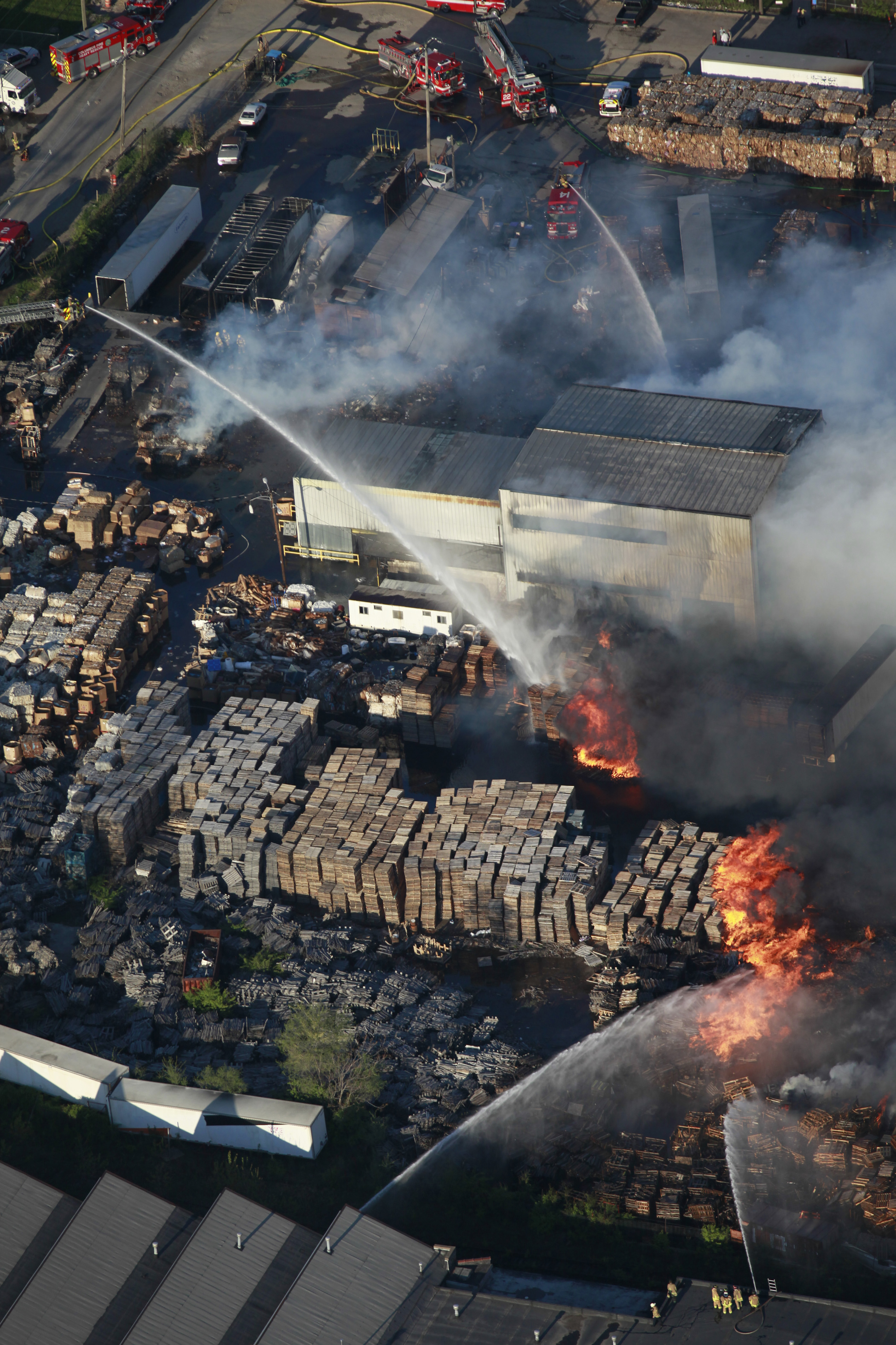 Fire official says smoke from warehouse fire likely toxic